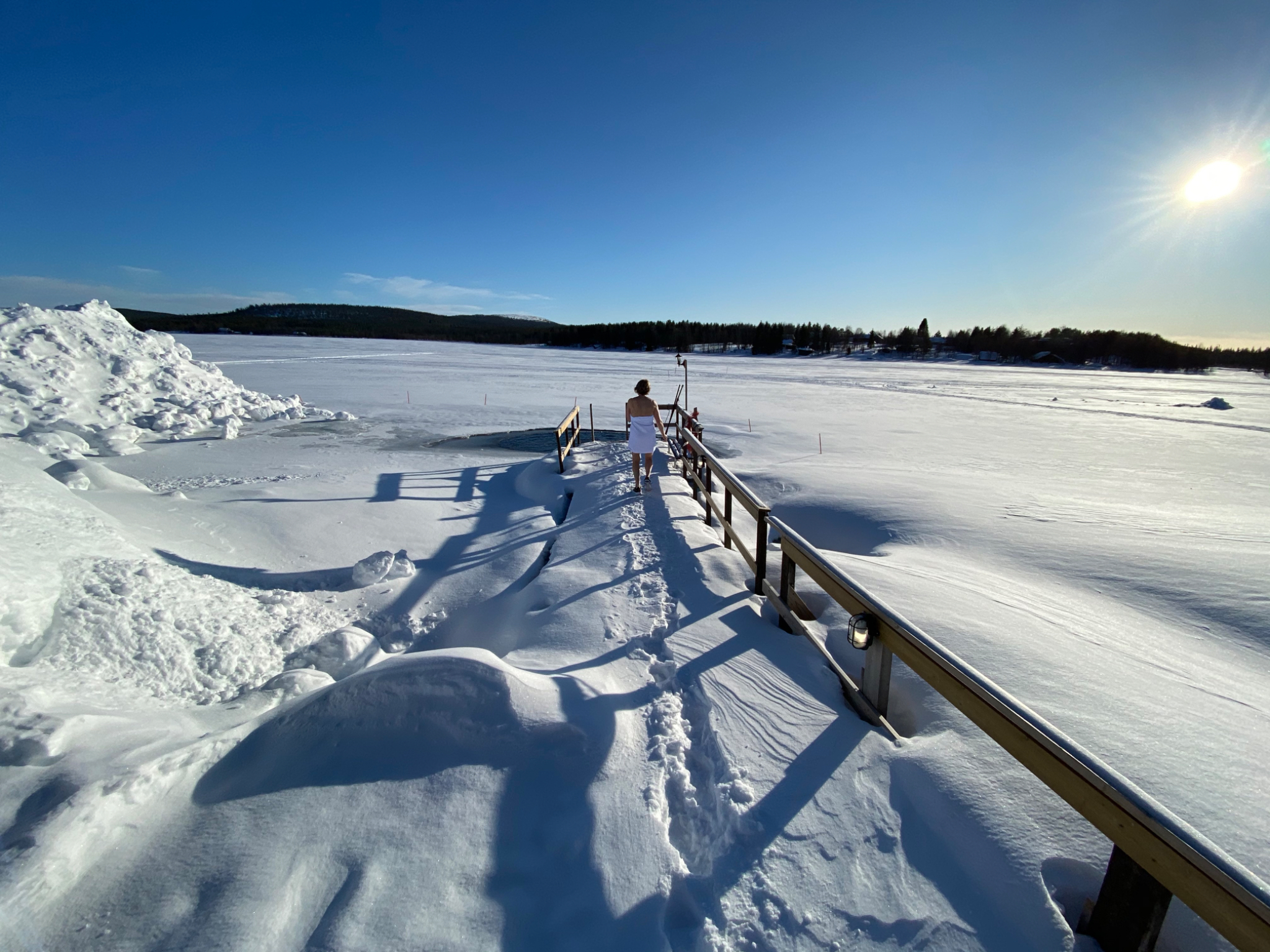 Walking from the sauna to the lake plunge